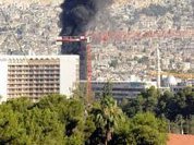 Dozens killed, balance attacks military base near Damascus