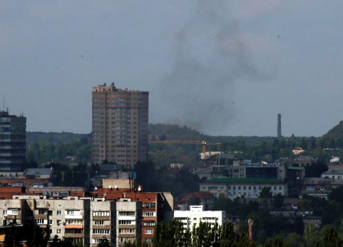 Ukraine shells Donetsk: Women and children killed