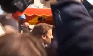 Macron attacked by tomatoes