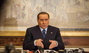 European Commission: Putin's gift to Berlusconi may violate sanctions