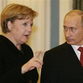 Putin stands firm in front of new German Chancellor Angela Merkel