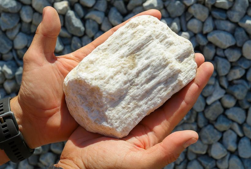 Lithium mineral in human hands