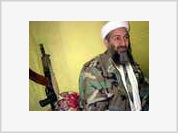 Osama bin Laden appears in new message holding a Kalashnikov
