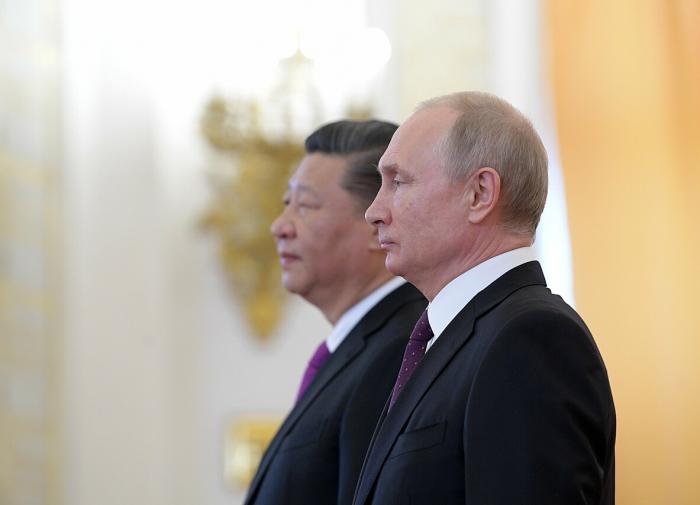 Putin is going to China with half of his revamped cabinet