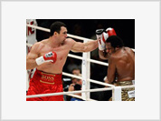 Klitschko beats Brewster despite broken hand