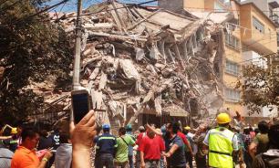 Girl found alive under school rubble in Mexico. Death toll climbs on