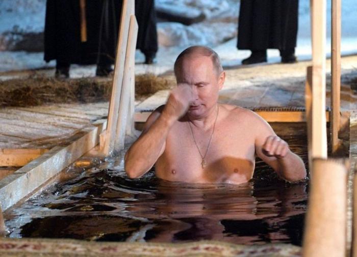 Putin dons James Bond blue swimtrunks for Epiphany icy dip