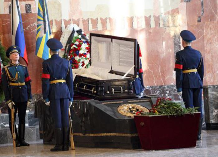 Russian regions bury servicemen killed in Ukraine