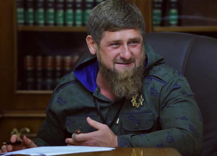 Chechen President Kadyrov shows video of his son beating young man for burning Koran