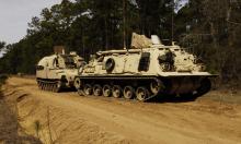 Russian Fighters Storm Ukrainian Positions on Captured NATO M113 with US and Russian Flags