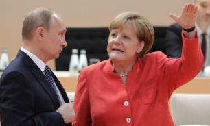 Putin and Merkel determined to continue cooperation after Bundestag elections