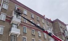 Snow-Clearing Worker Suspended on Wires After Falling from Roof