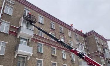 Snow-Clearing Worker Suspended on Wires After Falling from Roof