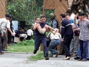 Fragments of former hostages' bodies found in a scrap heap in Beslan