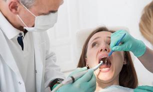 Dentist removes patient's 22 healthy teeth