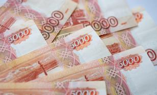 New Russian money may spark religious wars, priest says