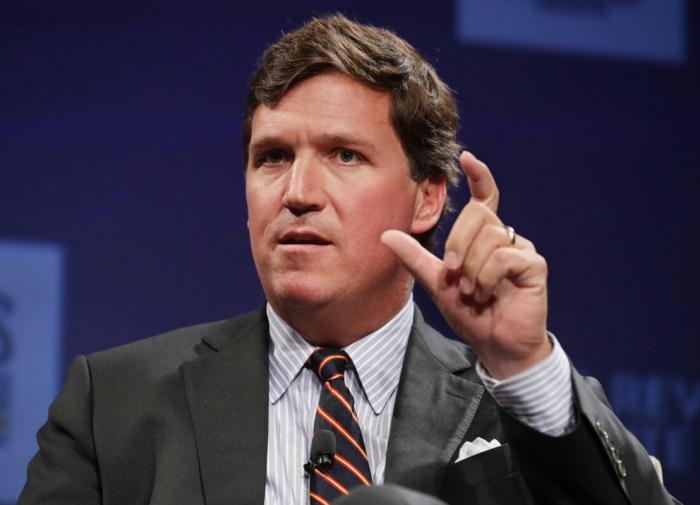 Tucker Carlson plus Moscow equals one love